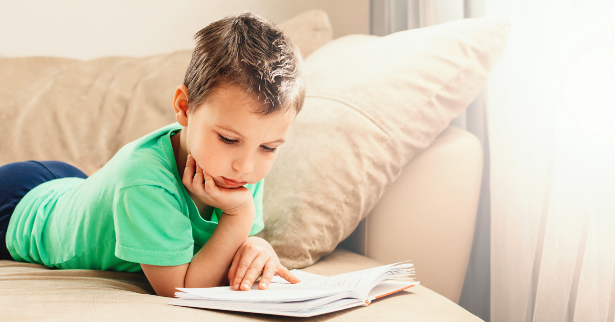 Child with dyscalculia dyslexia reading a book