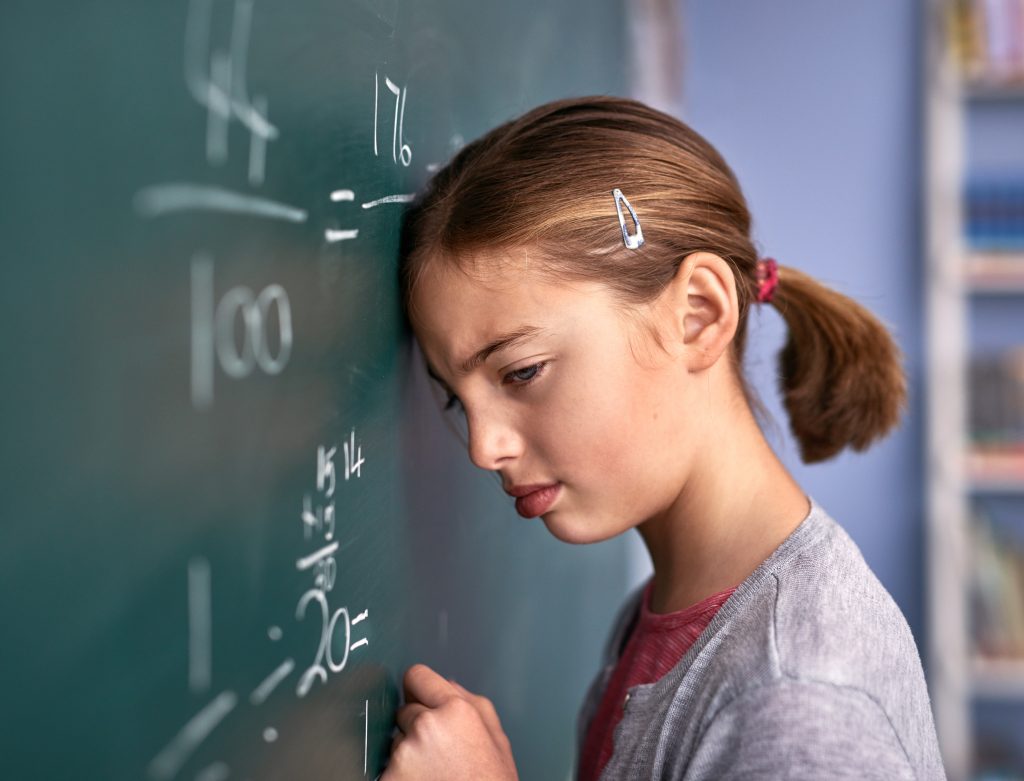 Girl with difficulties in mathematics